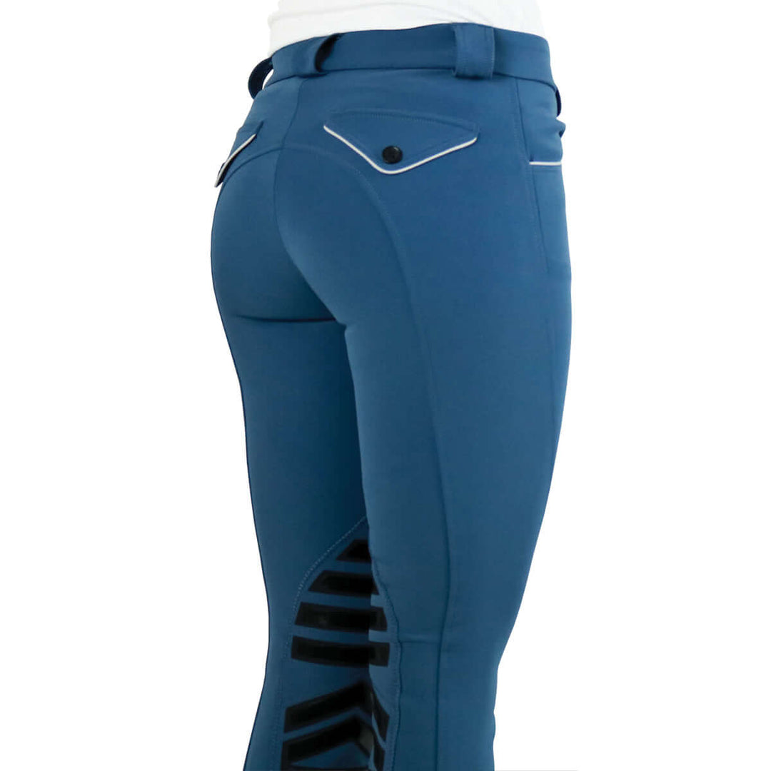 Stretch microfibre fabric for the most flattering fit on many body types. Keep their shape and don't fade out. Ride after ride, wash after wash.
Grip knee patches for maximum grip and comfort.
Silicone logo printing on the inside of the waistband to help breeches stay in place and shirts tucked in.
Comfort sock bottom to prevent rubbing around the ankle.
Contrast piping on front and rear pockets.