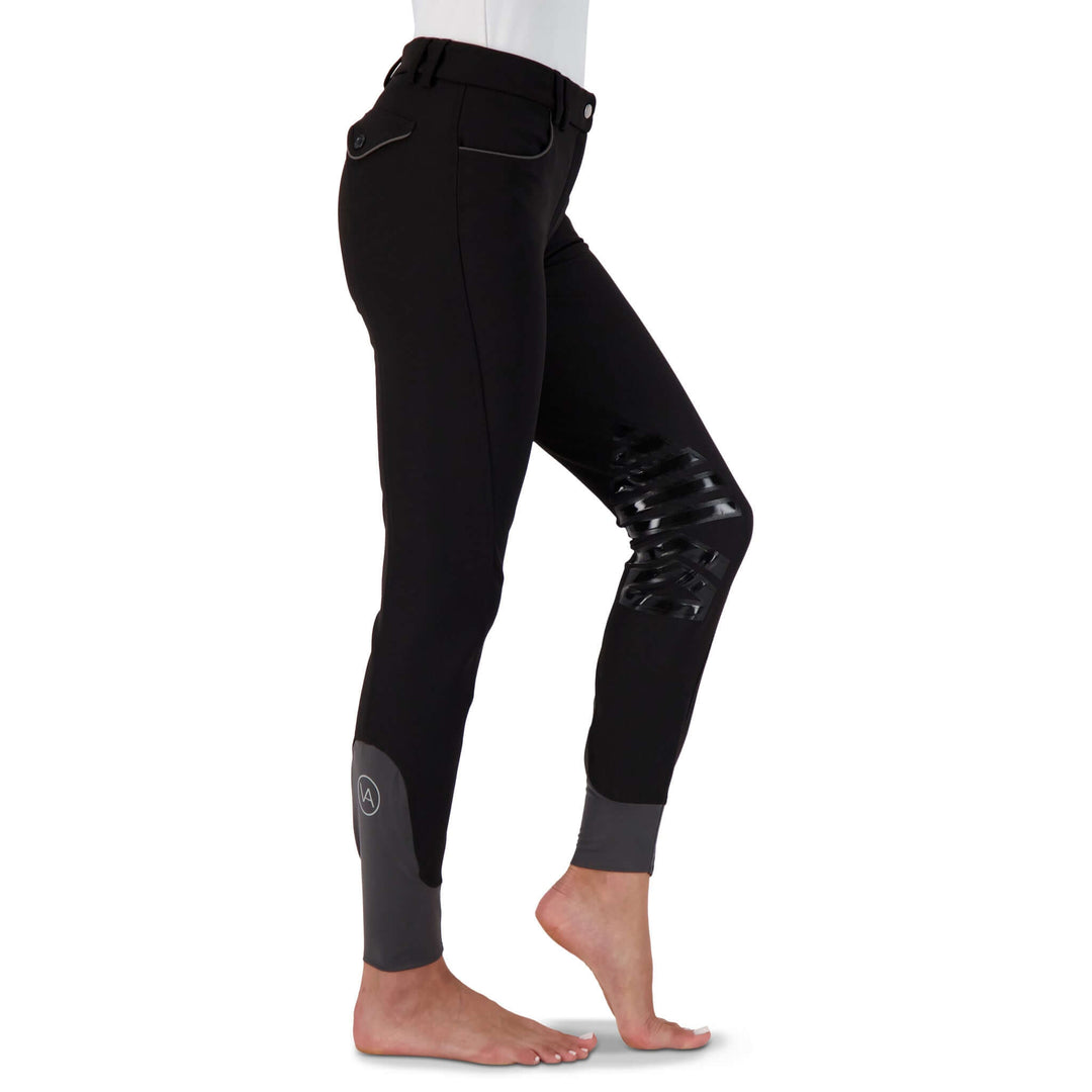 Stretch microfibre fabric for the most flattering fit on many body types. Keep their shape and don't fade out. Ride after ride, wash after wash.
Grip knee patches for maximum grip and comfort.
Silicone logo printing on the inside of the waistband to help breeches stay in place and shirts tucked in.
Comfort sock bottom to prevent rubbing around the ankle.
Contrast piping on front and rear pockets.