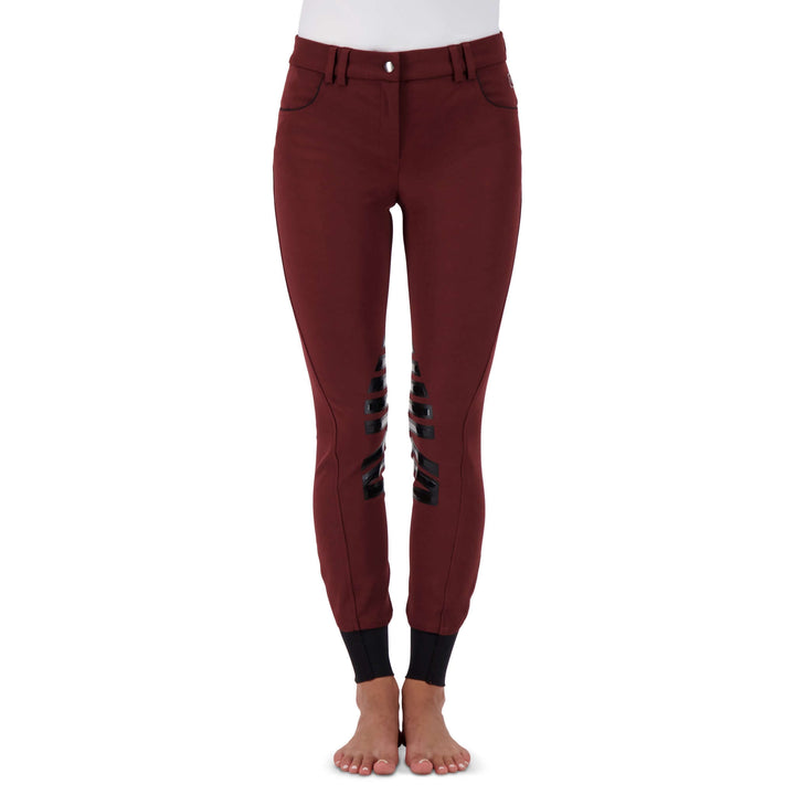 Stretch microfibre fabric for the most flattering fit on many body types. Keep their shape and don't fade out. Ride after ride, wash after wash.
Grip knee patches for maximum grip and comfort.
Silicone logo printing on the inside of the waistband to help breeches stay in place and shirts tucked in.
Comfort sock bottom to prevent rubbing around the ankle.
Contrast piping on front and rear pockets.