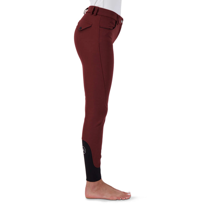 Stretch microfibre fabric for the most flattering fit on many body types. Keep their shape and don't fade out. Ride after ride, wash after wash.
Grip knee patches for maximum grip and comfort.
Silicone logo printing on the inside of the waistband to help breeches stay in place and shirts tucked in.
Comfort sock bottom to prevent rubbing around the ankle.
Contrast piping on front and rear pockets.