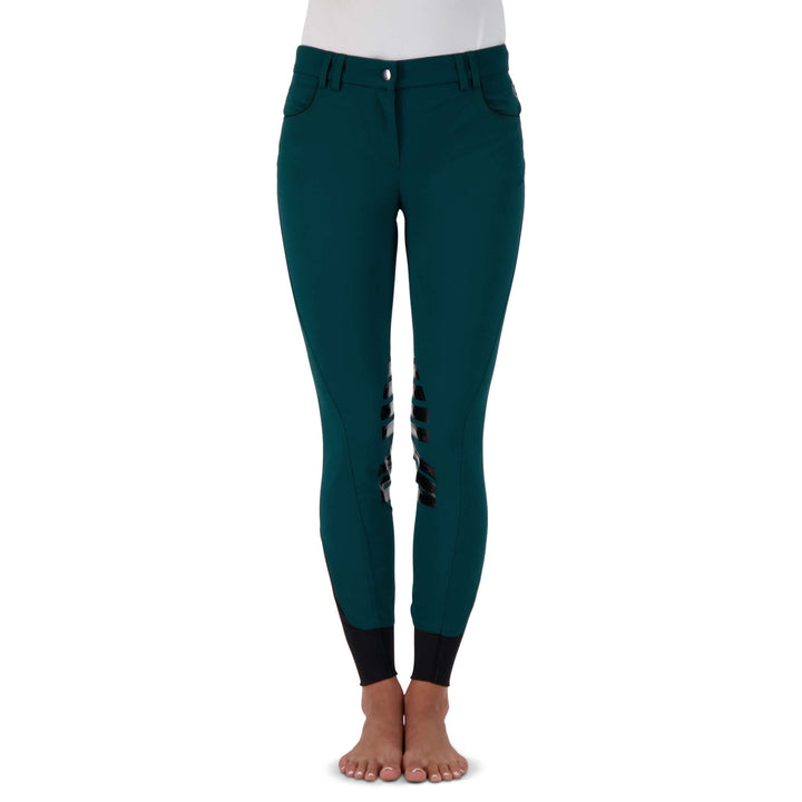 Stretch microfibre fabric for the most flattering fit on many body types. Keep their shape and don't fade out. Ride after ride, wash after wash.
Grip knee patches for maximum grip and comfort.
Silicone logo printing on the inside of the waistband to help breeches stay in place and shirts tucked in.
Comfort sock bottom to prevent rubbing around the ankle.
Contrast piping on front and rear pockets.